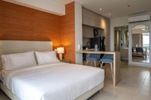 Voodi või voodid majutusasutuse Wynwood Cartagena Beach toas