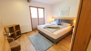 Posteľ alebo postele v izbe v ubytovaní MY APARTMENT krinzwald