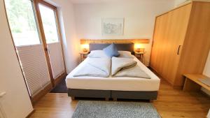 Posteľ alebo postele v izbe v ubytovaní MY APARTMENT krinzwald