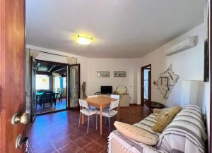 Posezení v ubytování Appartamento + 4 fotografie