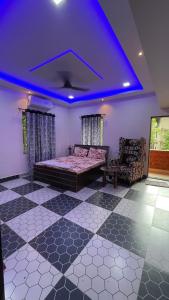 Postelja oz. postelje v sobi nastanitve MTDC Vishwas Homestay, Kotawde, Ratnagiri