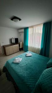 Postel nebo postele na pokoji v ubytování Hotel Falkor