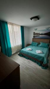 Postel nebo postele na pokoji v ubytování Hotel Falkor