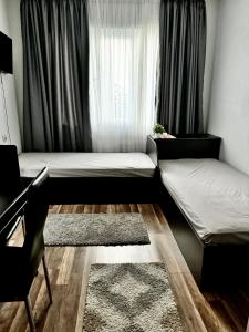 Ένα ή περισσότερα κρεβάτια σε δωμάτιο στο Apartment Alex