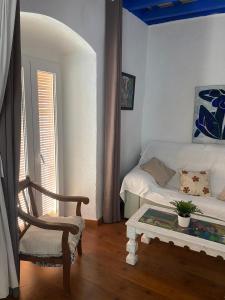Postel nebo postele na pokoji v ubytování Casa Amparo casco histórico