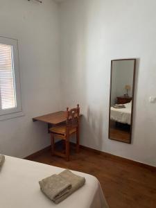 Postel nebo postele na pokoji v ubytování Casa Amparo casco histórico
