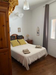 Postel nebo postele na pokoji v ubytování Casa Amparo casco histórico