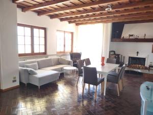 a living room with a couch and a table at Villa Nonna Elisa in Pieve