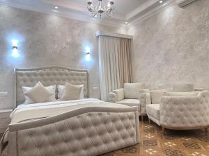 Postel nebo postele na pokoji v ubytování Royal Renaissance Hotel + 37 fotografií