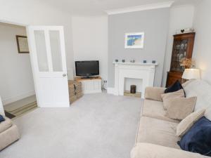 TV a/nebo společenská místnost v ubytování The Anchorage