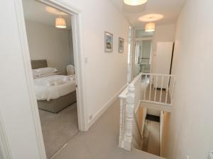 Postel nebo postele na pokoji v ubytování The Anchorage