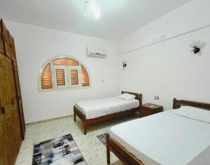 Ένα ή περισσότερα κρεβάτια σε δωμάτιο στο Garden Challet