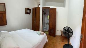 Cama o camas de una habitación en Casa Romano Hostel