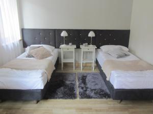 Letto o letti in una camera di Amadea