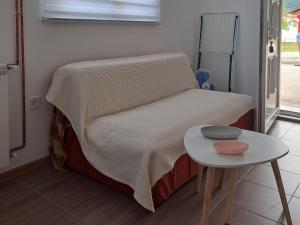Postel nebo postele na pokoji v ubytování Studio apartman "Kutak DIVUS"