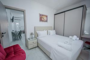 A bed or beds in a room at Maria's Home