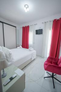A bed or beds in a room at Maria's Home