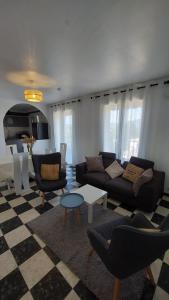 Posezení v ubytování Ogooué appartement entier Lumineux 94m2 maxi 6 couchage 3 chambres