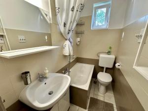 Kúpeľňa v ubytovaní Pálkövei 65. Apartman