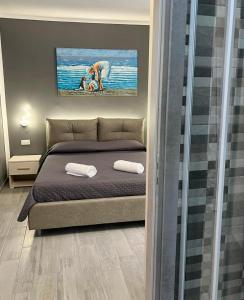Postel nebo postele na pokoji v ubytování Costa degli Dei Rooms
