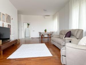 TV a/nebo společenská místnost v ubytování CASA di GIO'