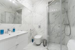 Koupelna v ubytování Molo Centrum by Grand Apartments
