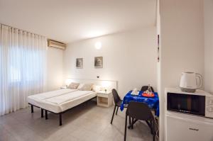 Postel nebo postele na pokoji v ubytování Aparthotel Carinzia