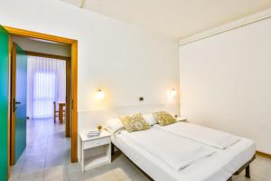 Postel nebo postele na pokoji v ubytování Aparthotel Carinzia