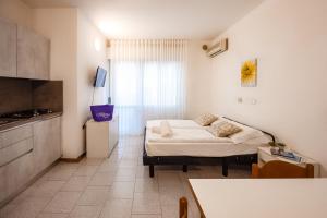 Postel nebo postele na pokoji v ubytování Aparthotel Carinzia