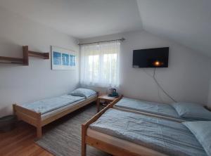 Postel nebo postele na pokoji v ubytování Fregata