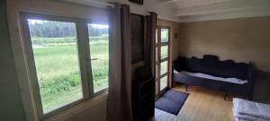 Posezení v ubytování Kārkliņi Tiny House & Camping