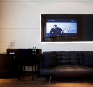 TV a/nebo společenská místnost v ubytování Villa & Spa