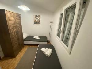 Ένα ή περισσότερα κρεβάτια σε δωμάτιο στο Papita