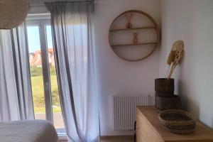 Ένα ή περισσότερα κρεβάτια σε δωμάτιο στο Beautiful apartment with garden +4 φωτογραφίες