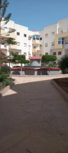 an empty parking lot in front of a building at Nador al jadid chaabi in Nador