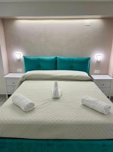Postel nebo postele na pokoji v ubytování Costa degli Dei Rooms