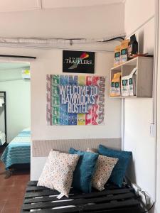 a room with a bench with pillows on it at Hammocks - Hamacas in Ríohacha