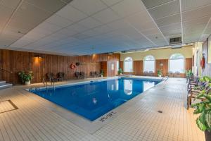 a large swimming pool in a hotel room at Glengarry Extended Stays in Truro