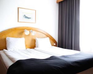 En eller flere senger på et rom på Best Western Karlshamn Spa & Relax