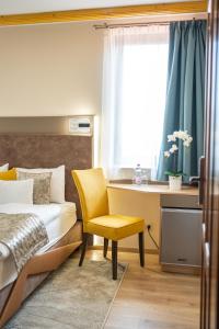 Postel nebo postele na pokoji v ubytování MeDoRa Park - Hotel MeDoRa***