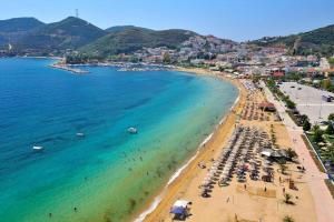 an aerial view of a beach with people and the ocean at Seaside paradise in Iraklitsa