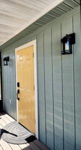 a front door of a house with a porch at Green Roof House Studio in Lakeland +9 photos