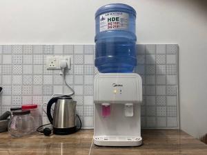 Příslušenství pro přípravu čaje a kávy v ubytování Homestay AZ