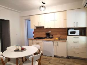 Kuchyň nebo kuchyňský kout v ubytování Apartments Jasna