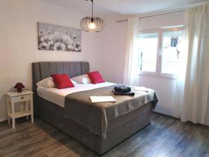 Postel nebo postele na pokoji v ubytování Apartments Jasna