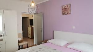 Postel nebo postele na pokoji v ubytování Apartments Jasna