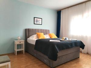 Postel nebo postele na pokoji v ubytování Apartments Jasna + 37 fotografií