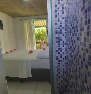 En eller flere senge i et værelse på Casa de Samuel Lobritis