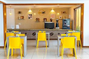 TV a/nebo společenská místnost v ubytování Makai Resort Aracaju All Inclusive Pacote 7 diárias de agosto a novembro + 2 fotografie
