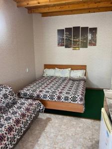 Letto o letti in una camera di Podsolnukhi Guest House